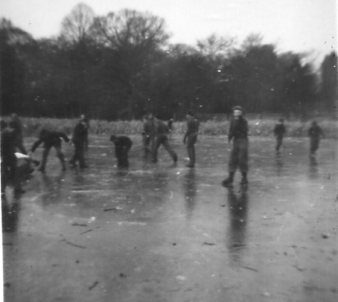Glyn Burch OT90 on the skates with several unidentied people 29 January 1950<br>