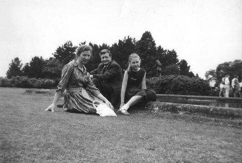 Family posing by the mirror pond mid 60s<br>Father and mother of J Lovegrove 812 with his sister Jane.