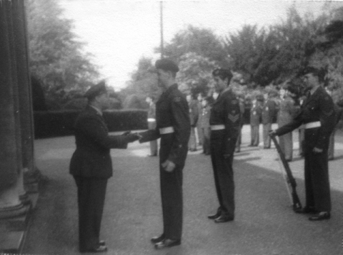 Photo supplied by Richard Woolfrey OT 423<br>ATC annual inspection. R Woolfrey being awarded sword of honour for being a good cadet for a spell. The flight sergeant in background is Patrick Tootal later selected for RAF Cranwell. The corporal is Kevin Mayall .