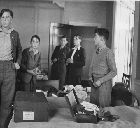 First day at Ottershaw’, September 20th., 1948.<br>Michael Campbell- Lamerton is shown with Keith Strudwick, Derek Colley, Ronald Montgomery and Peter Glucksman in Elgar dormitory. It appears that Strudwick and Glucksman are actually allocated to the dormitory and are unpacking.