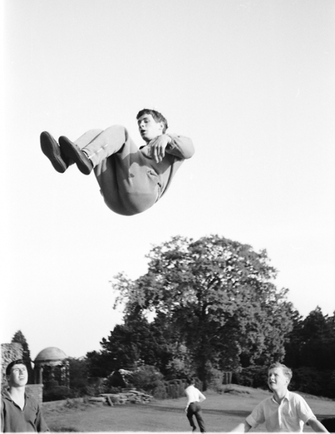 Trampoline - 1959 - © Mike Leggett<br>Not the last moments of a suicide attempt, or a tree climbing mishap, but an summer evening session on the school trampoline, dragged out of the adjacent gym. In the background, a corner of the Formal Gardens.